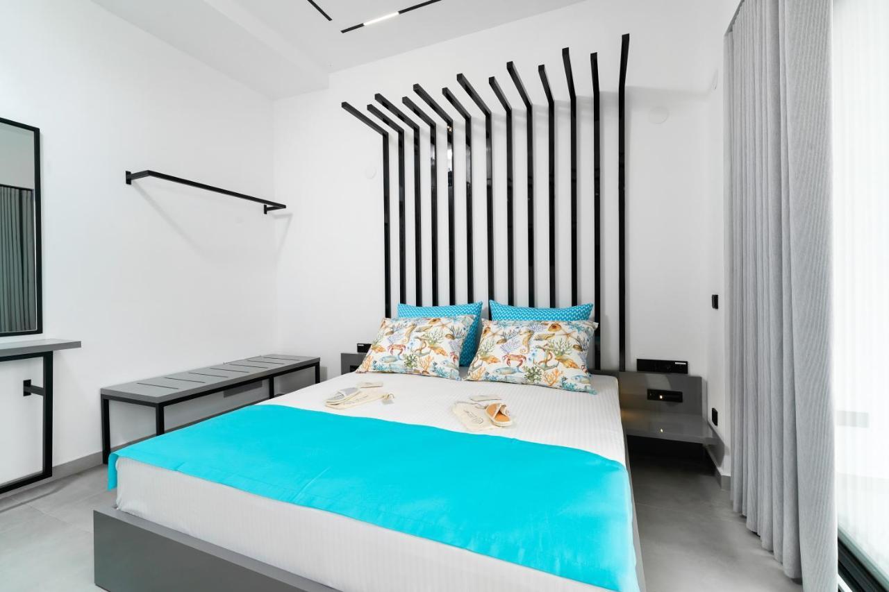 Mythodea Prive Luxury Suites Chrysi Ammoudia ภายนอก รูปภาพ