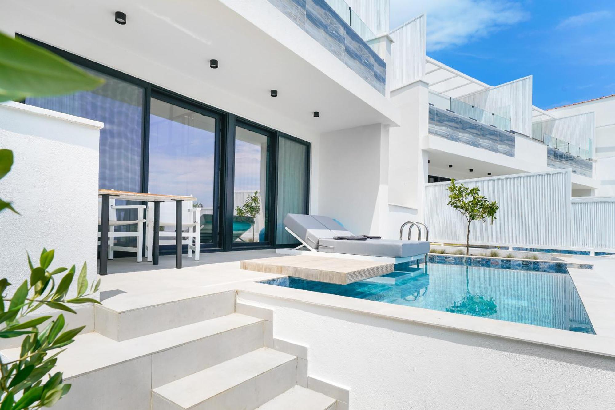 Mythodea Prive Luxury Suites Chrysi Ammoudia ภายนอก รูปภาพ