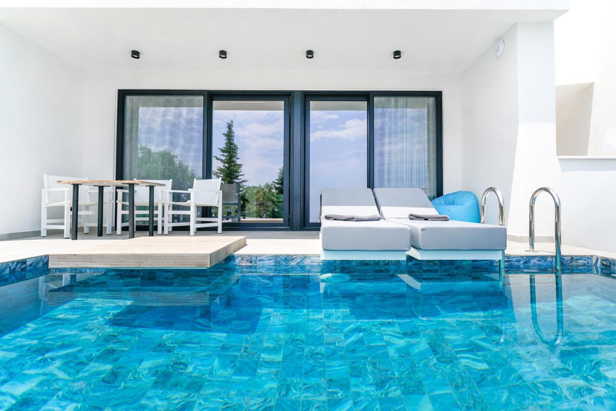 Mythodea Prive Luxury Suites Chrysi Ammoudia ภายนอก รูปภาพ
